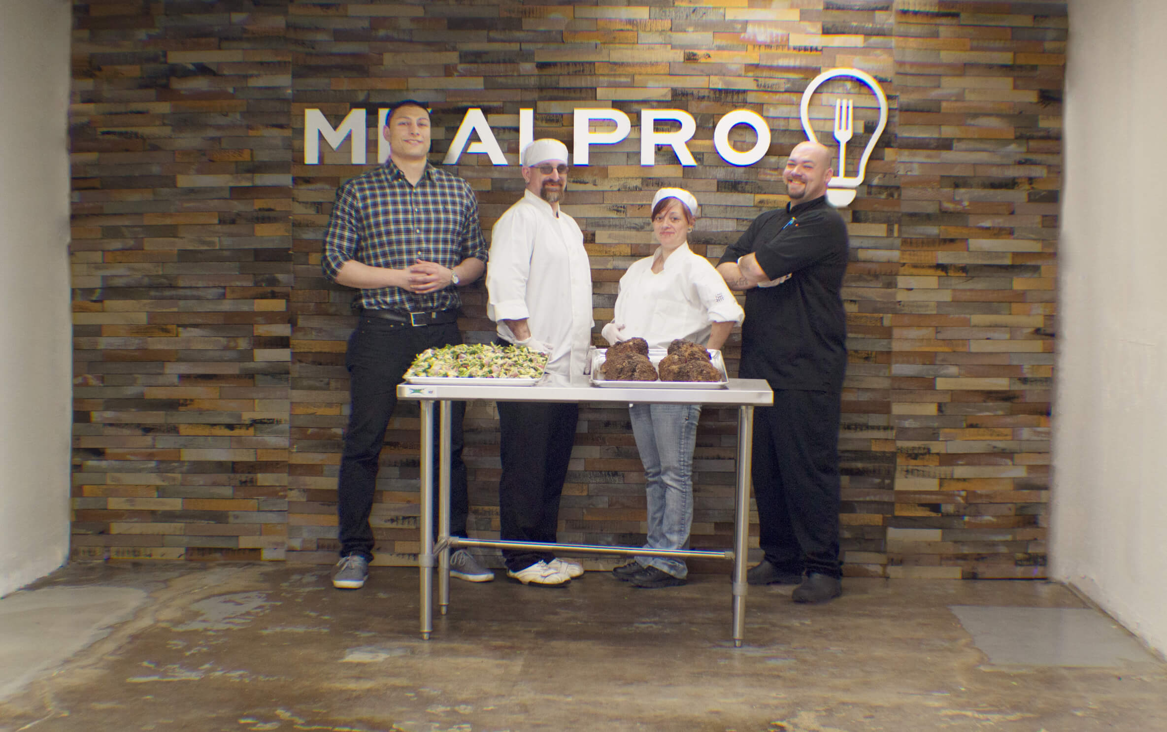 How You Can Grow Your Team While Defining Your Corporate Culture Andy Sartori with the MealPro kitchen team in the early stages of corporate growth
